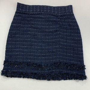Fringed mini skirt zipper in back
